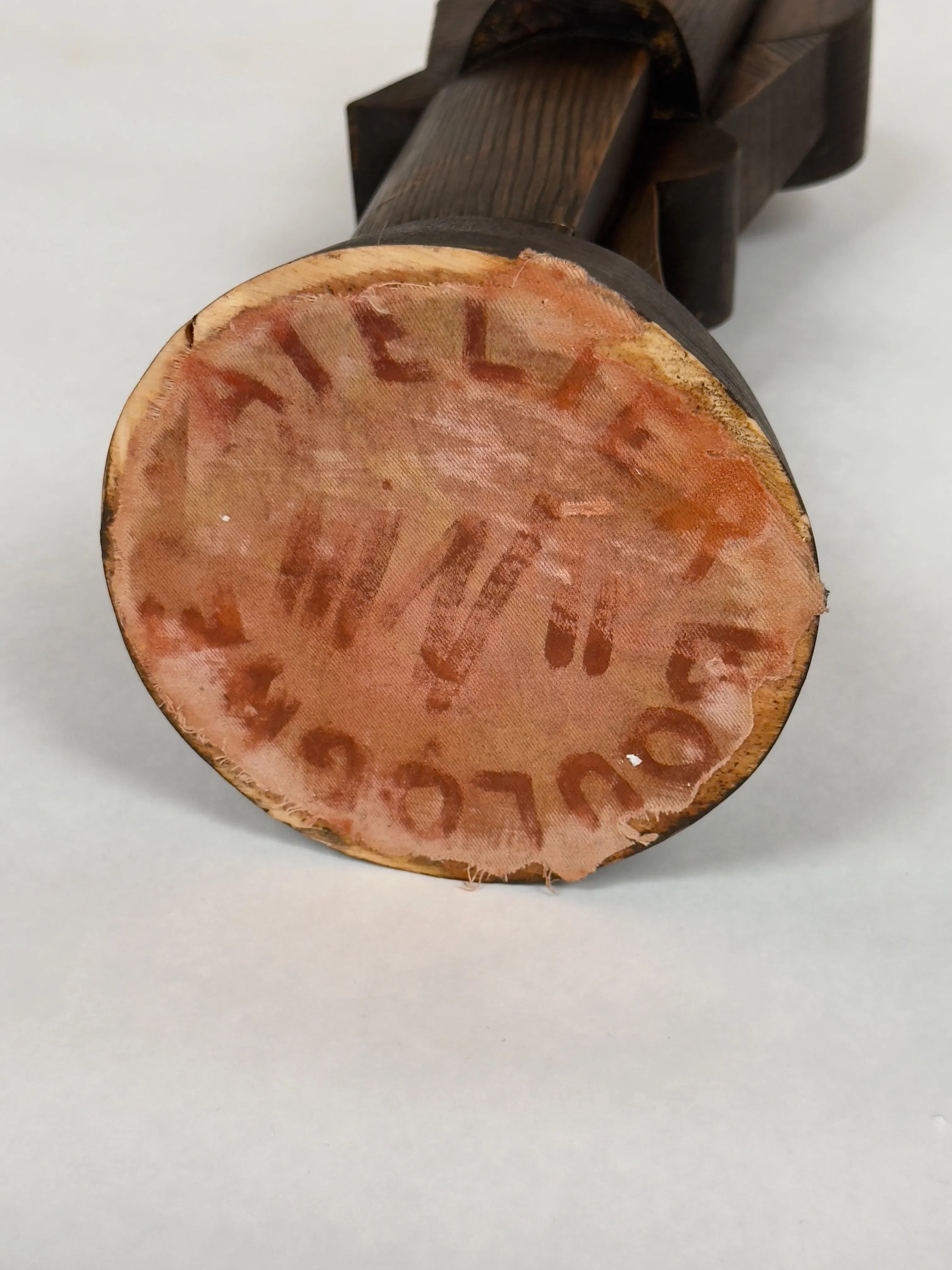 The underside shows a wooden piece with a fabric base stamped "ATELIER M/M SOLOGNE" in red ink. The dark wood and aged fabric convey the classic allure of Cubist abstraction, typical of an Atelier Boulogne creation, such as "Cubist Sculpture No. 3" from the 1960s by Galerie Storm.