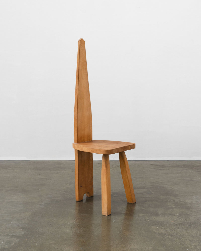 Brutalist high back wooden chair by Tom Bogle with angular design