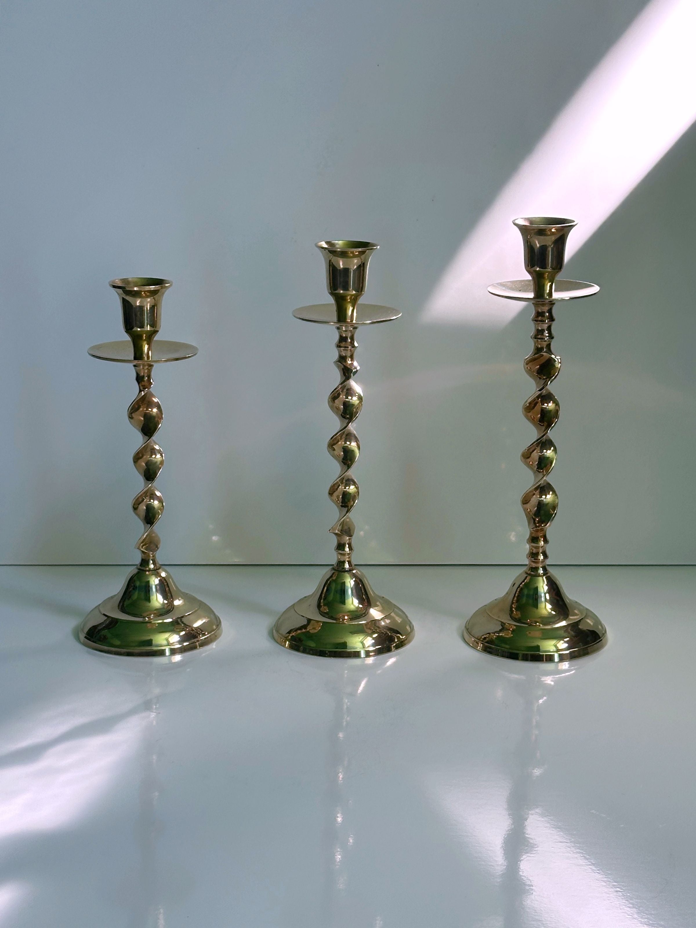3 Candleholders Made of Polished Brass
