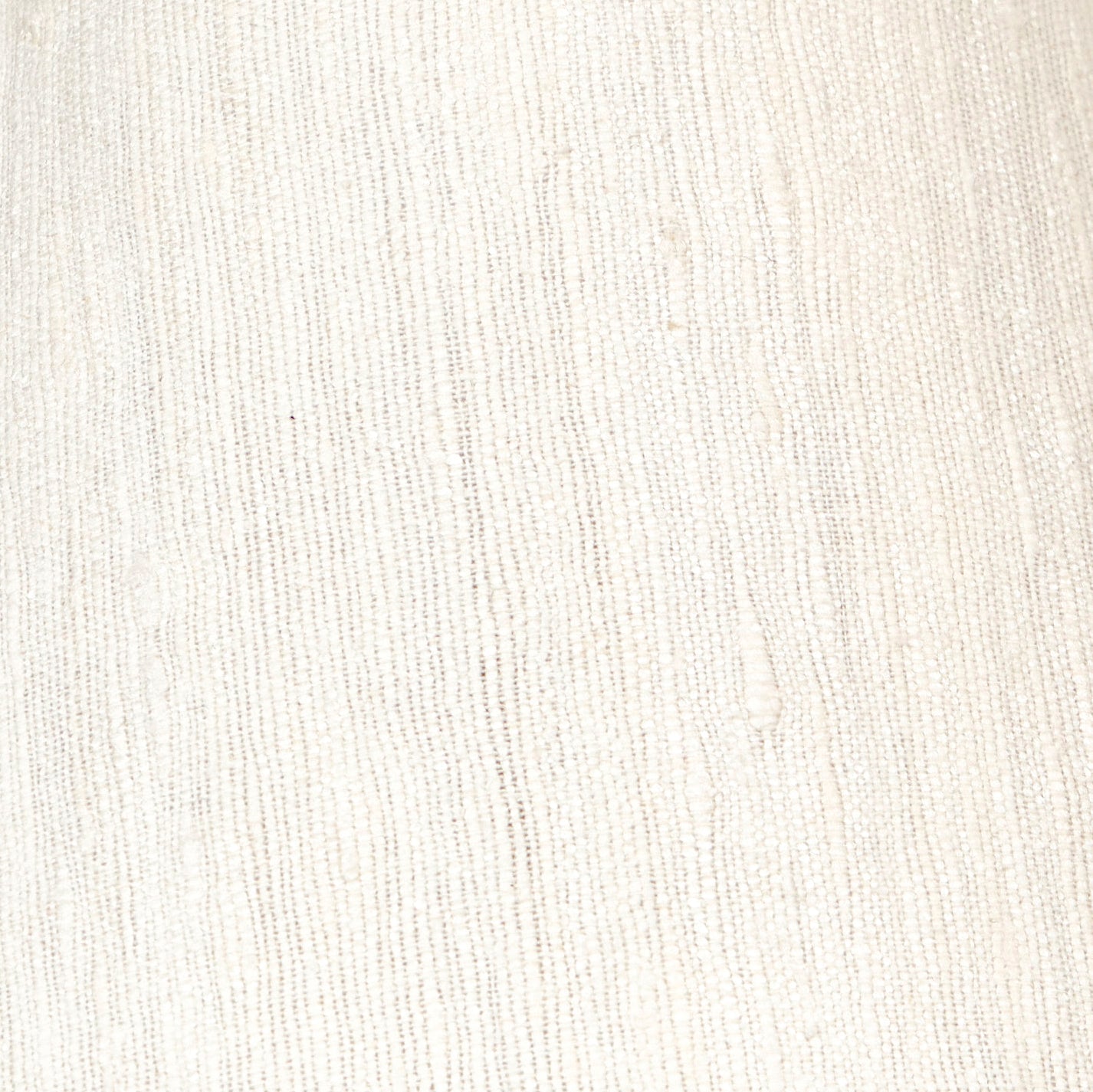 Close-up of light beige fabric with visible weave and subtle stripes, ideal for pairing with the Project 213A Arouca Table Light Coral White. The soft, natural texture adds warmth and style to any space.