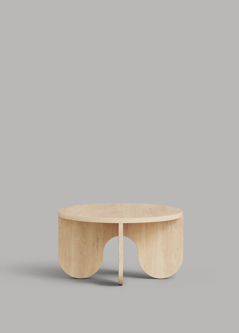 Round wooden coffee table with arched legs, natural finish