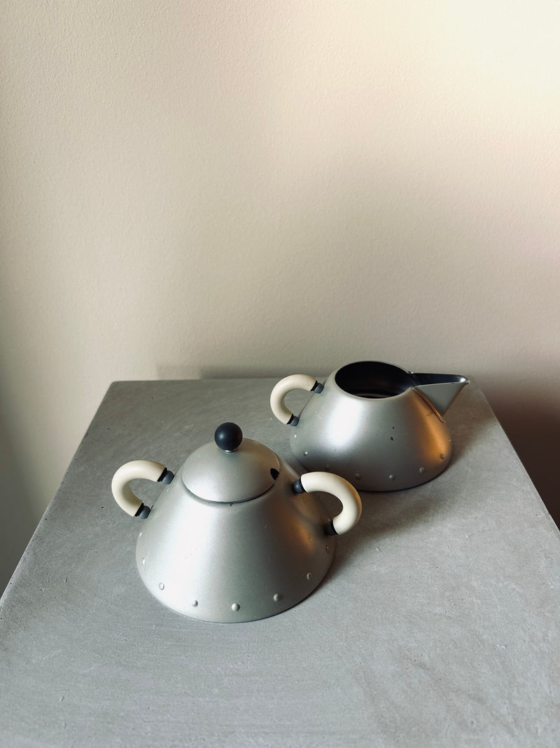 Vintage Alessi Sugar Pot & Creamer Set, a stylish addition to any tea or coffee service, featuring a unique design and high-quality craftsmanship