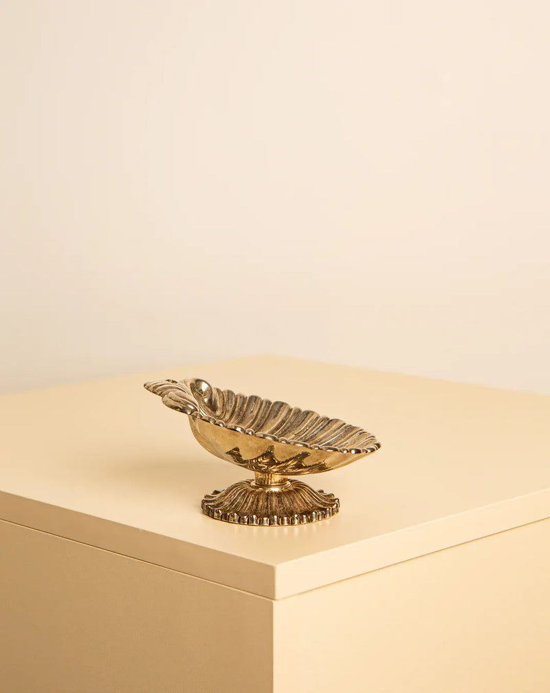 Vintage Italian metal shell dish with ornate design and classic 1960's style aesthetic