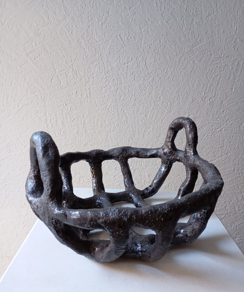 Black stoneware corbeille decorative bowl with organic cutout design