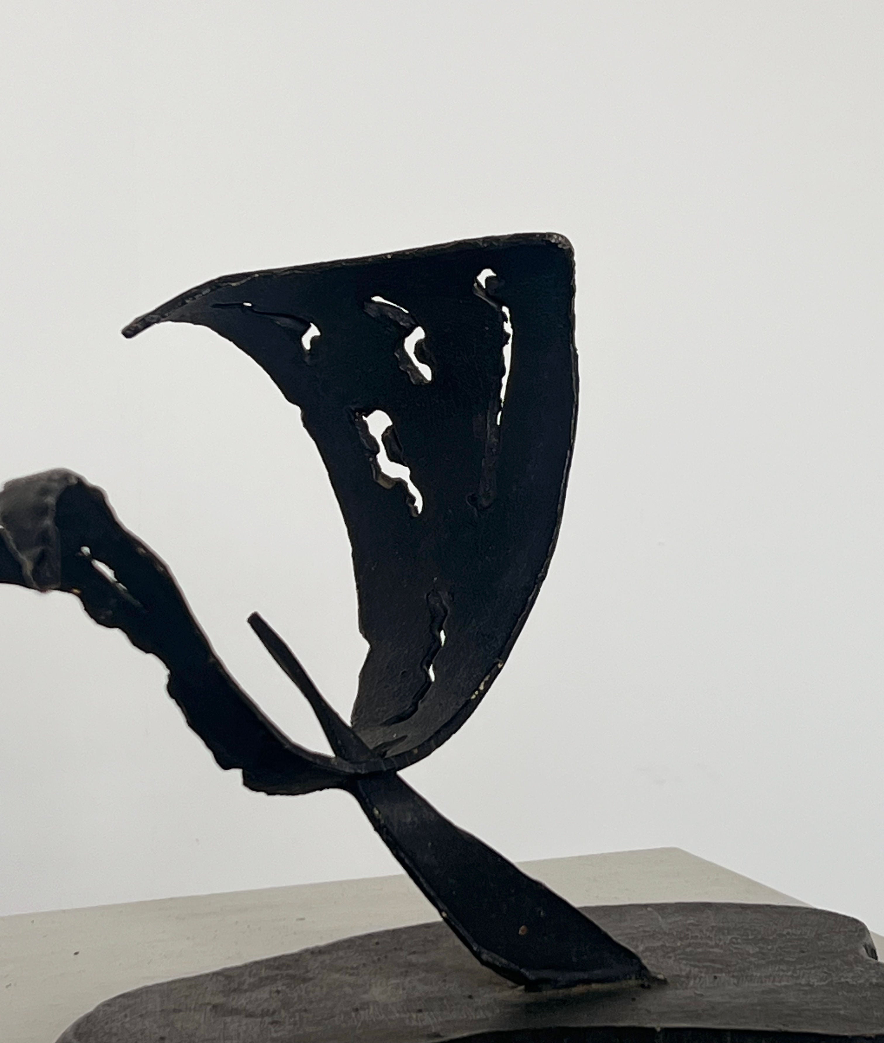Brutalist iron ribbon sculpture