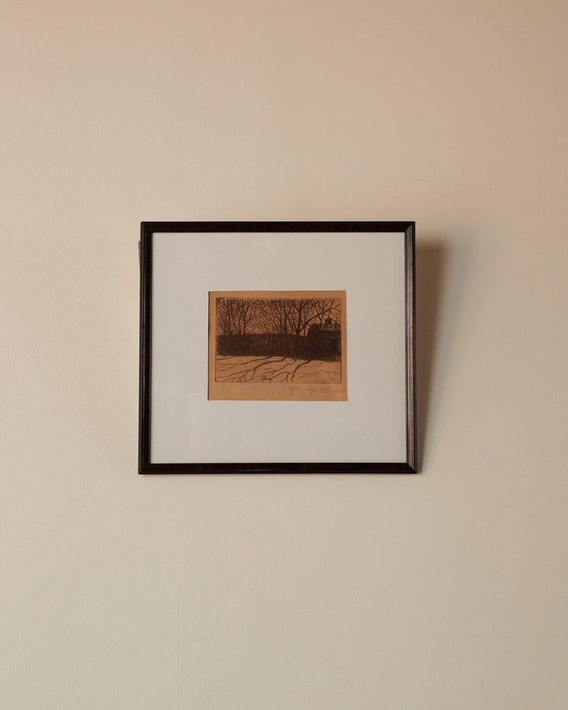 Framed Oscar Lycke etching depicting winter landscape with bare trees