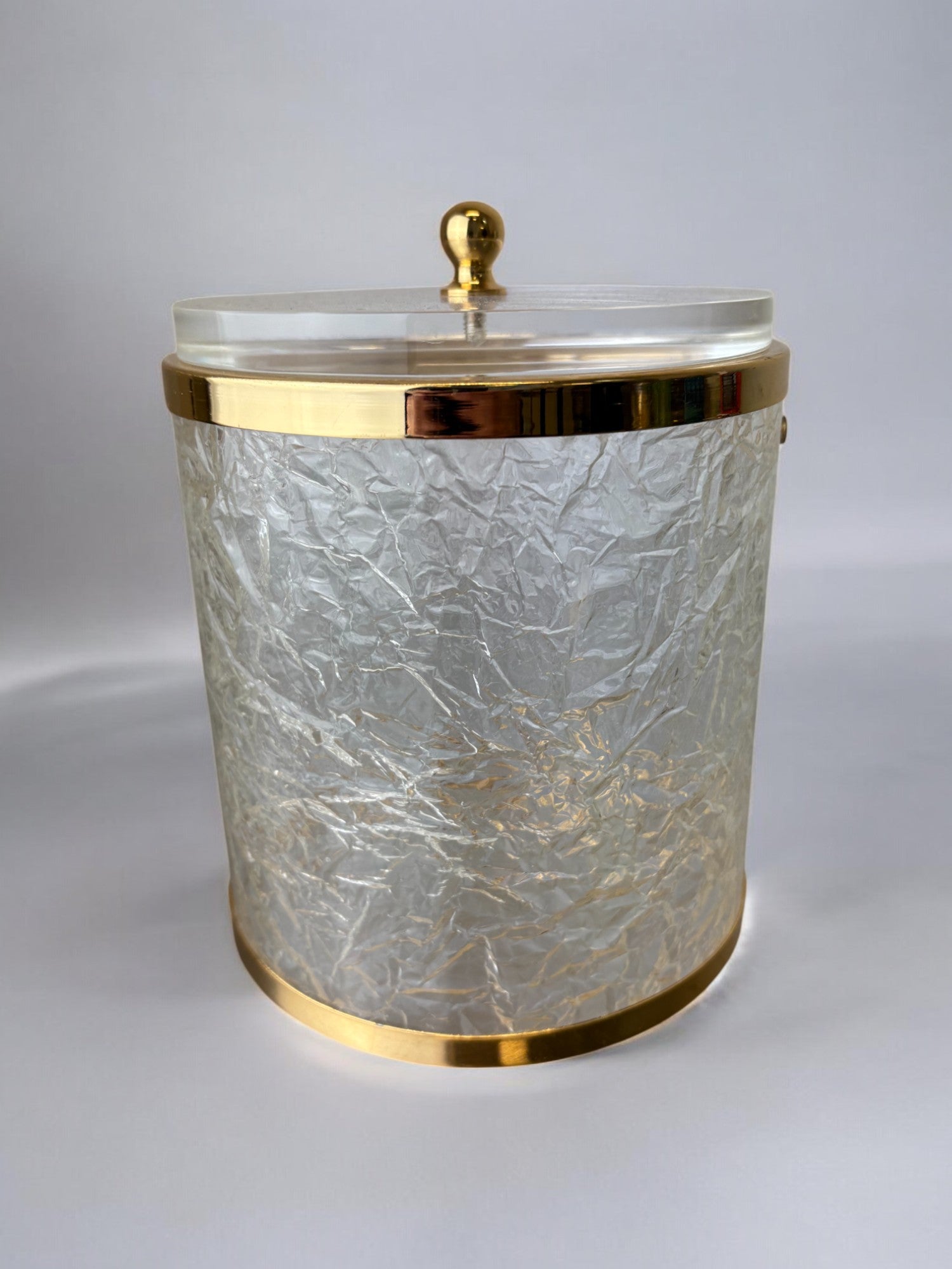 Vintage lucite ice bucket with textured surface and gold brass trim 1970s