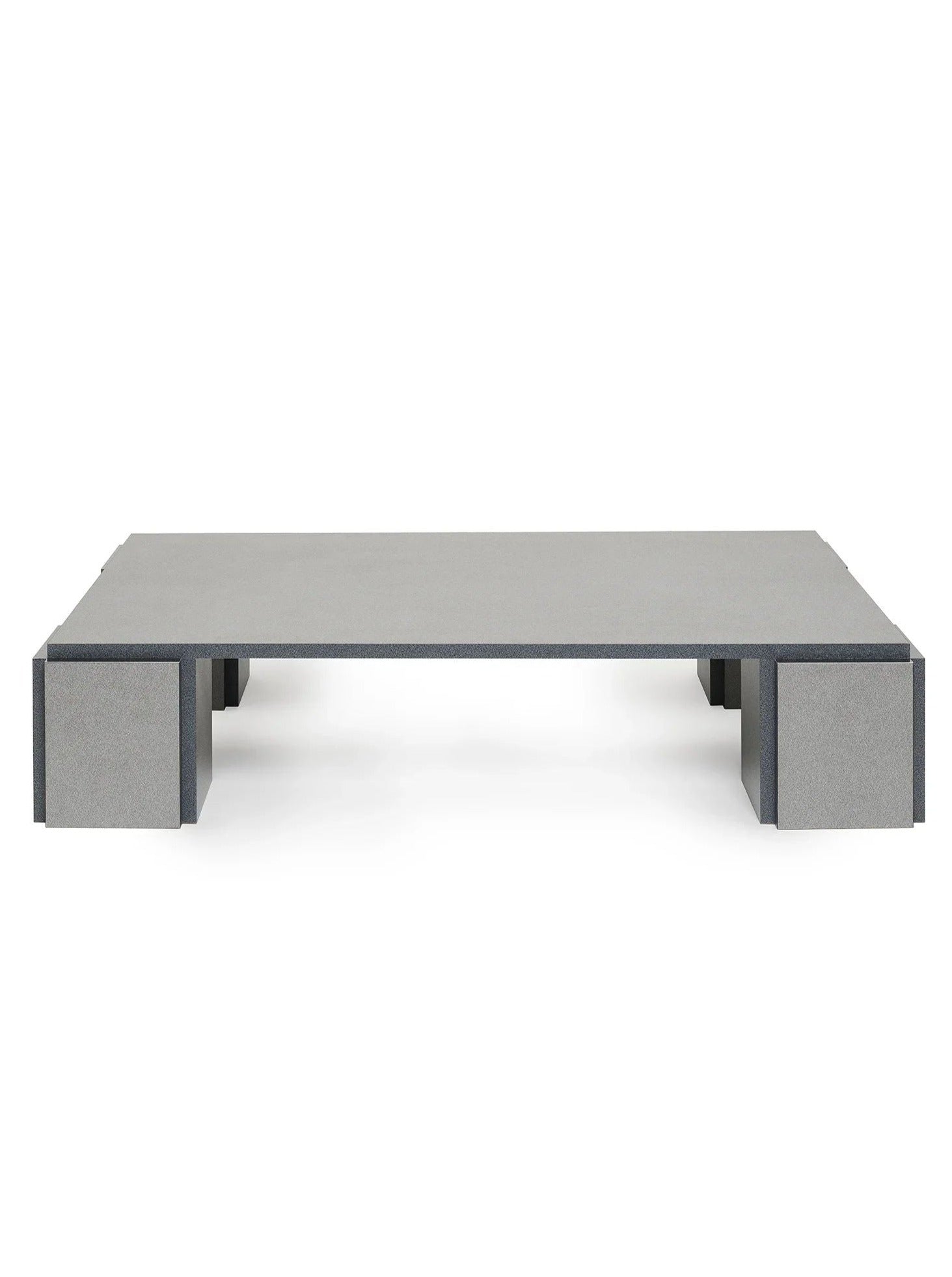 Introducing the "Mara" Coffee Table – Night Noise by TEGET: a minimalist gray piece with a rectangular shape and low profile. Featuring thick, block-like legs and a smooth, laminated surface, this table exudes contemporary elegance and sturdy design.