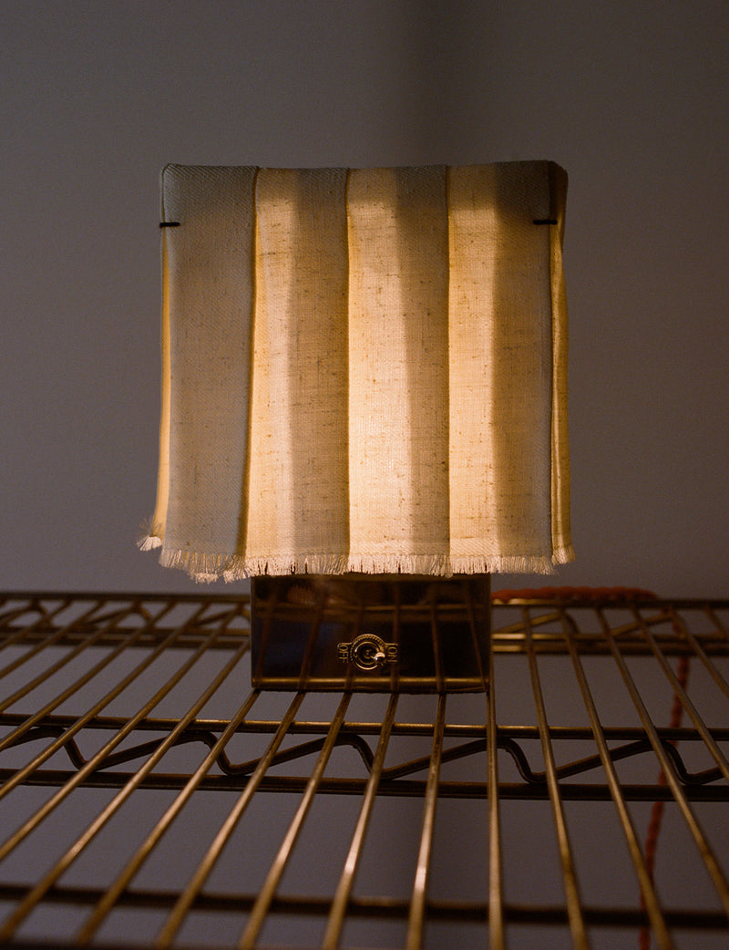 Vintage brass table lamp with fabric shade and fringe trim