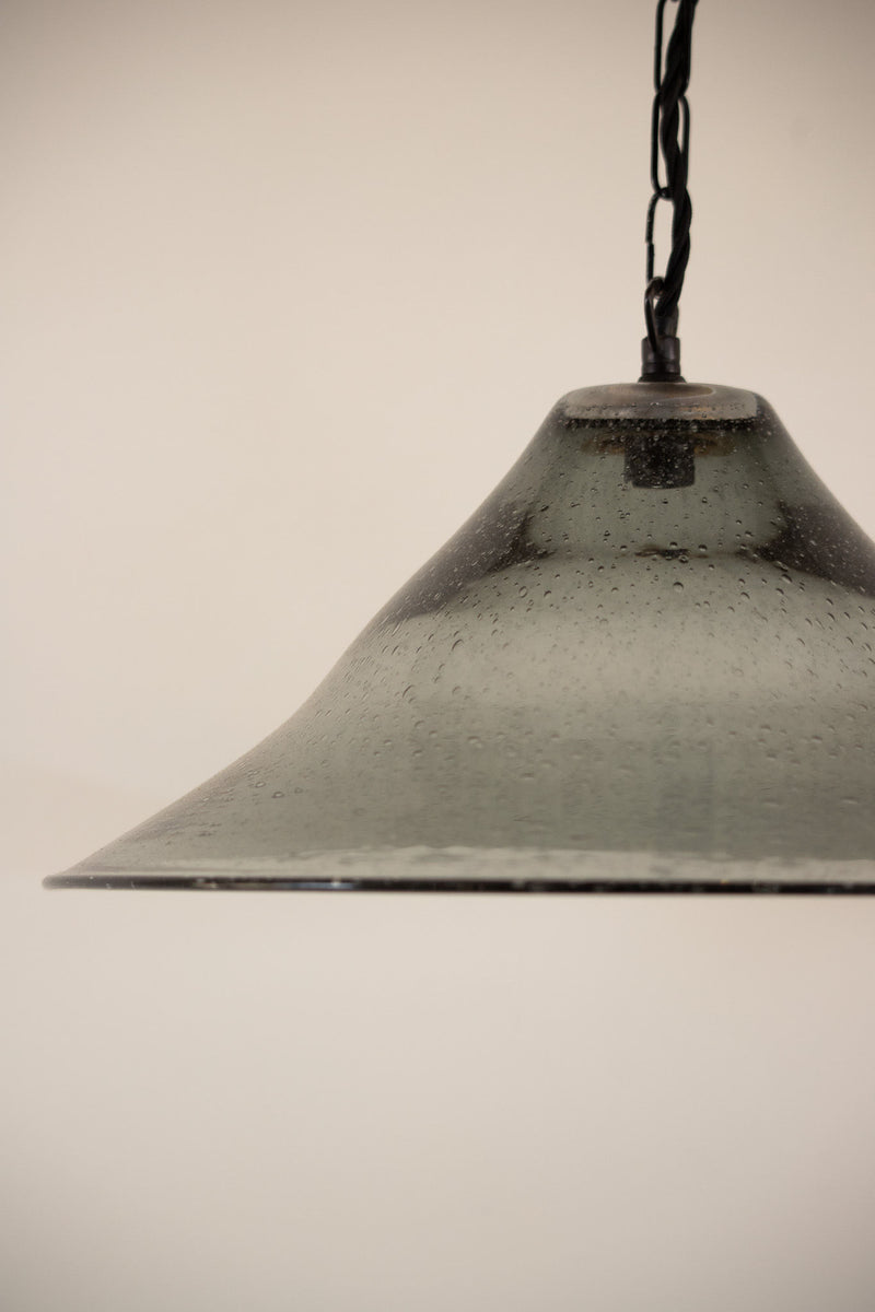 Seeded glass bell pendant with water droplet texture detail