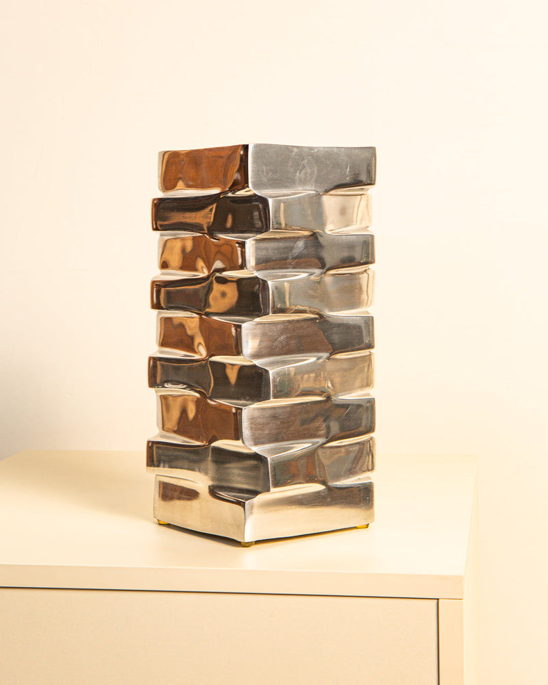 Escalier aluminum vase with stacked reflective geometric blocks design