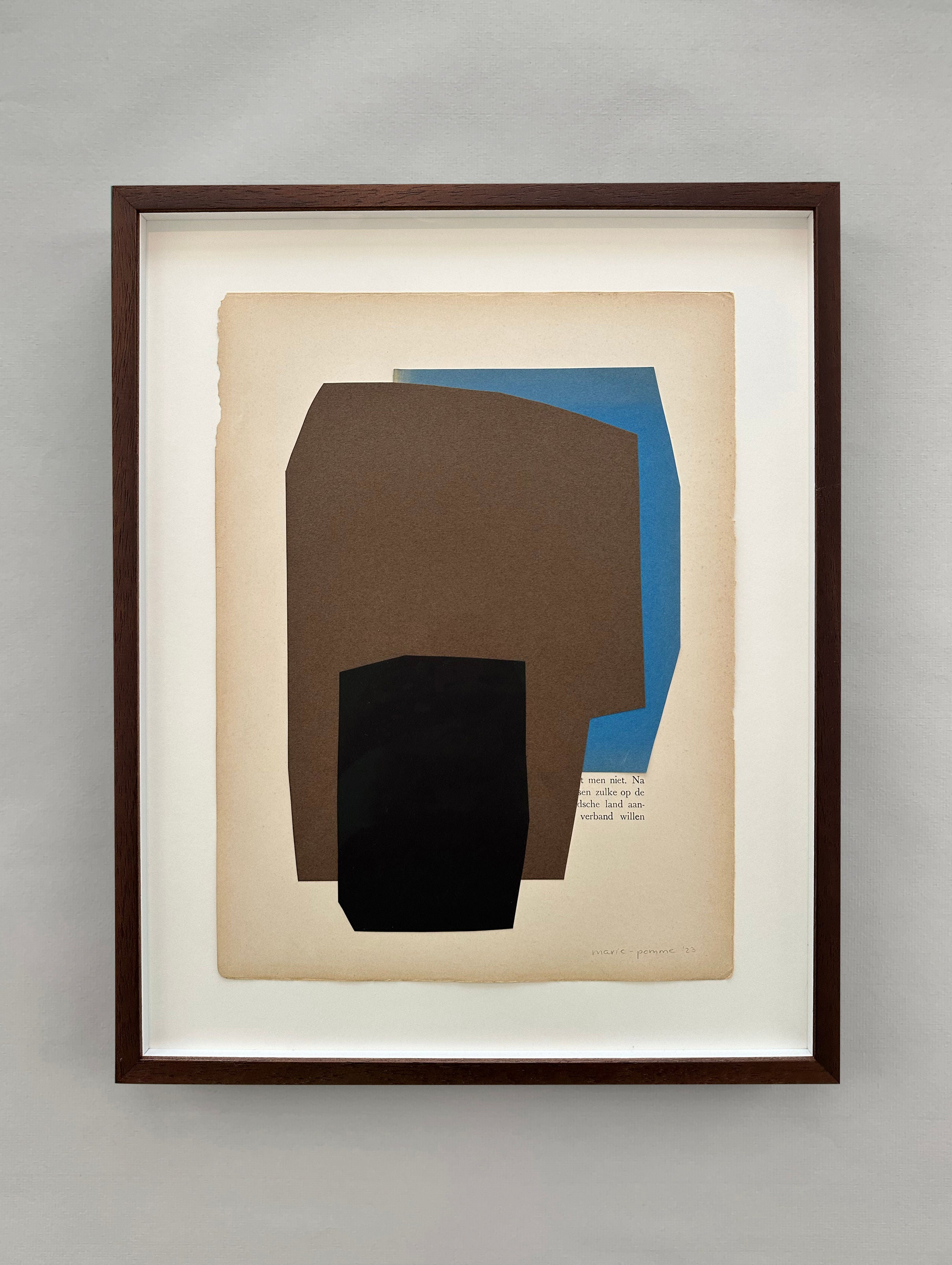 Marie Pomme Adriaansen's "Blue Series #2 - Paper Collage" is an abstract artwork in a wooden frame with overlapping geometric shapes in brown, blue, and black on an aged paper background. It creates a collage effect with a small text block in the lower right corner.