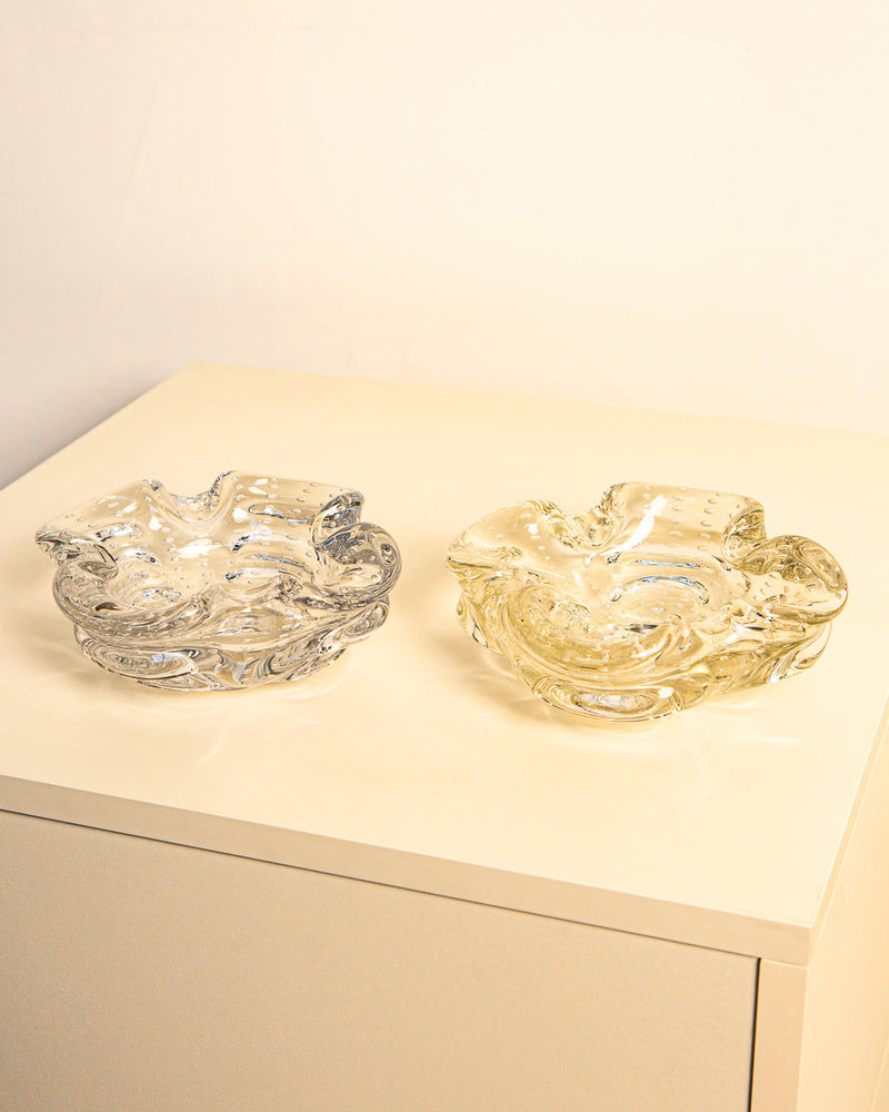 Pair of vintage Murano glass ashtrays in clear and amber tones