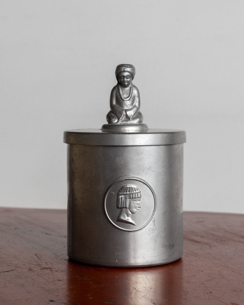 Art Deco pewter box with Egyptian Revival figure and medallion detail