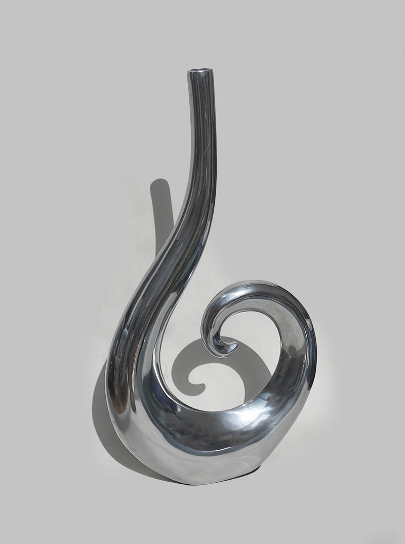 Polished chrome spiral vase with curved sculptural form