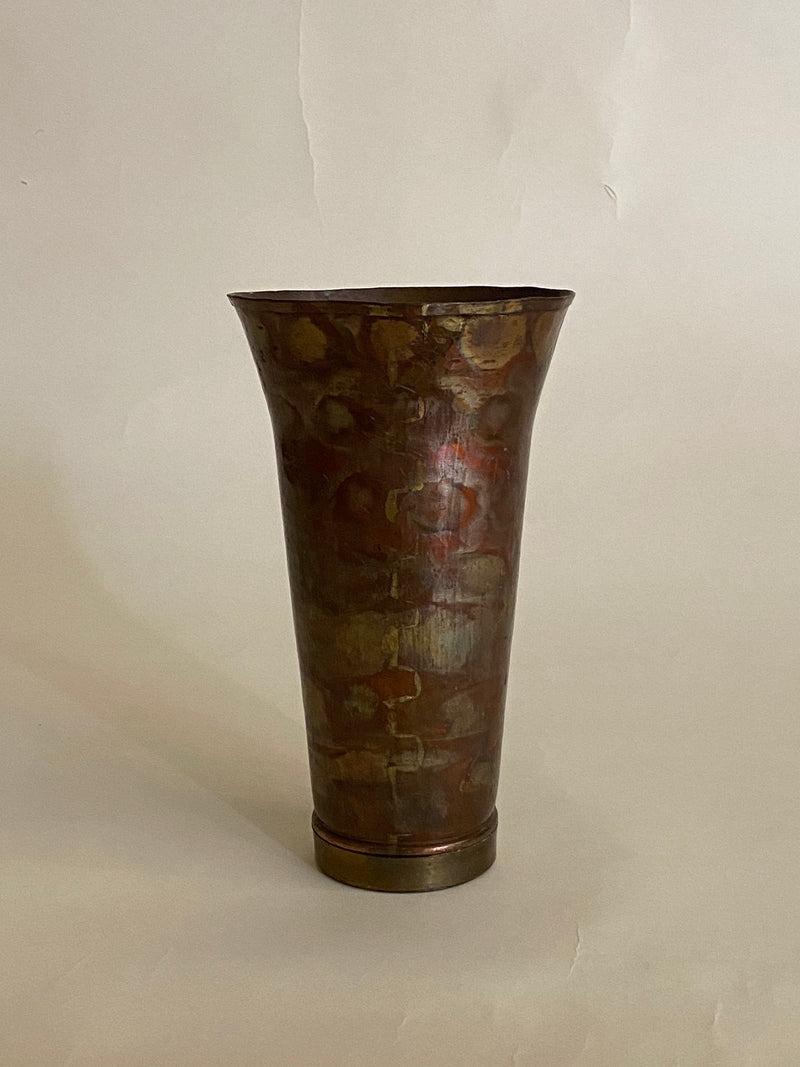 Vintage dinanderie vase showing detailed copper brass patina surface
