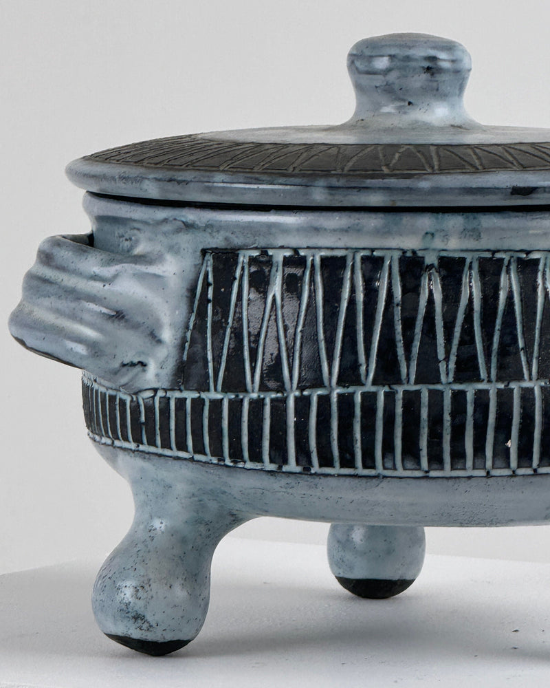 Detail view of Jacques Pouchain ceramic tureen with carved patterns