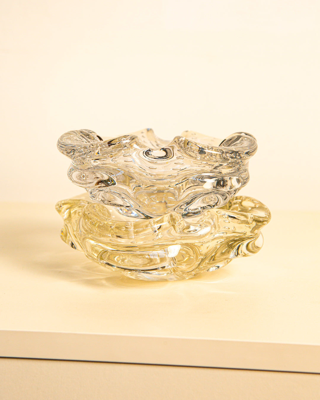 Clear glass Murano ashtray with organic flowing design from 1980s