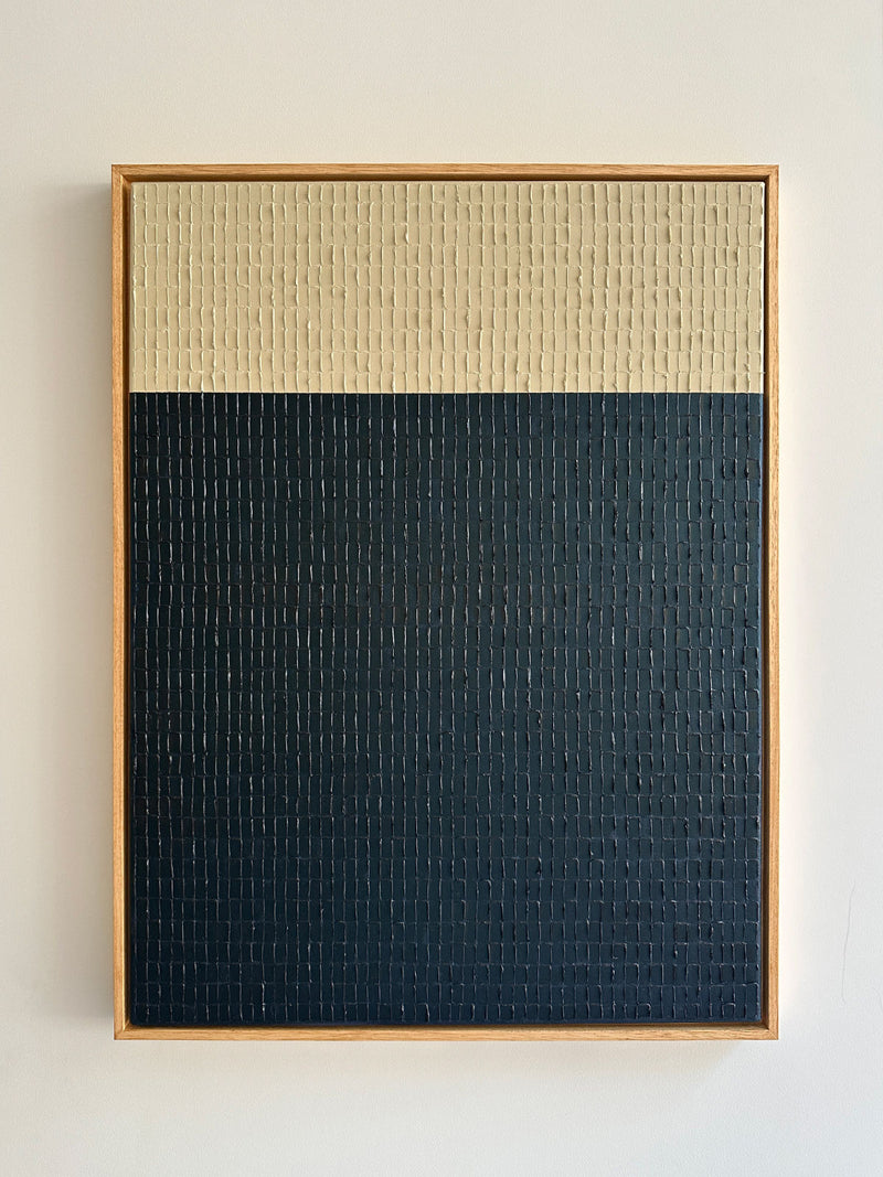 Abstract textured painting with cream upper section and dark teal lower section by Roi Elmaliah