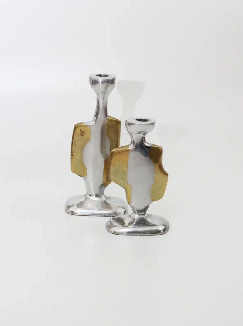 Modernist candleholders in a brutalist style, perfect for contemporary decor