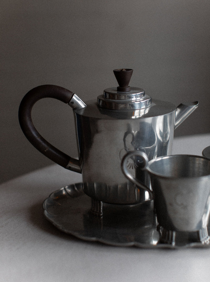 Antique Art Deco Swedish Grace Tea-set featuring delicate tea cups and saucers