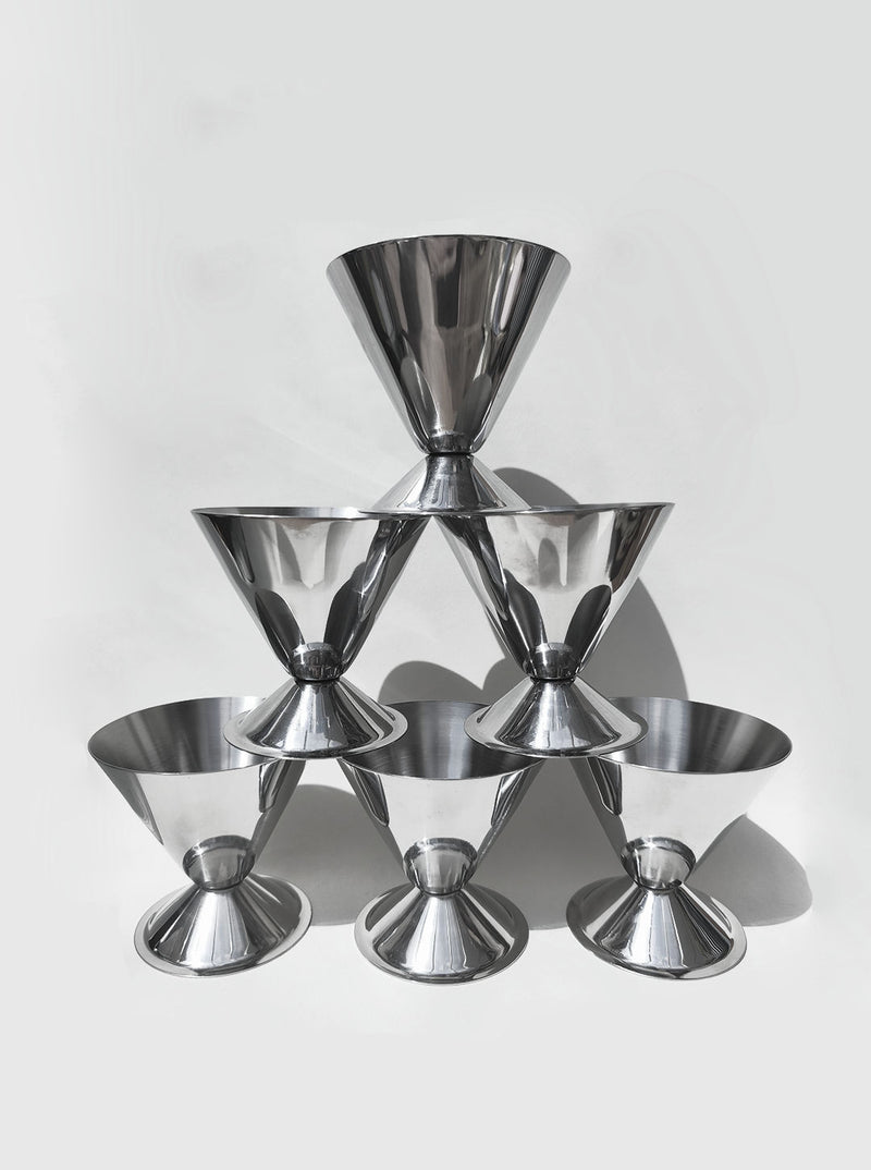 Set of 6 vintage metallic conic cups stacked in pyramid formation