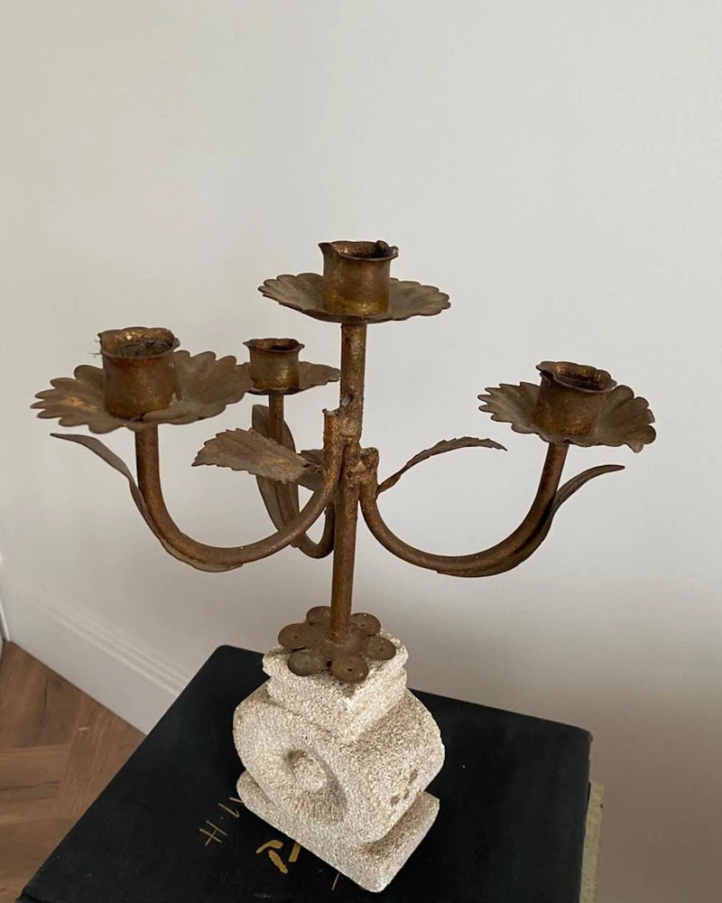 Vintage French brass candelabra with floral base on stone block