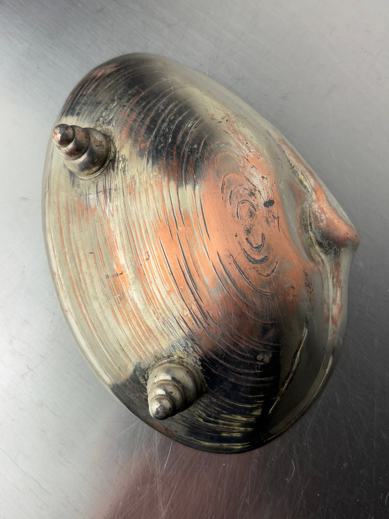 Close-up detail of Italian shell vide-poche showing mother-of-pearl iridescence