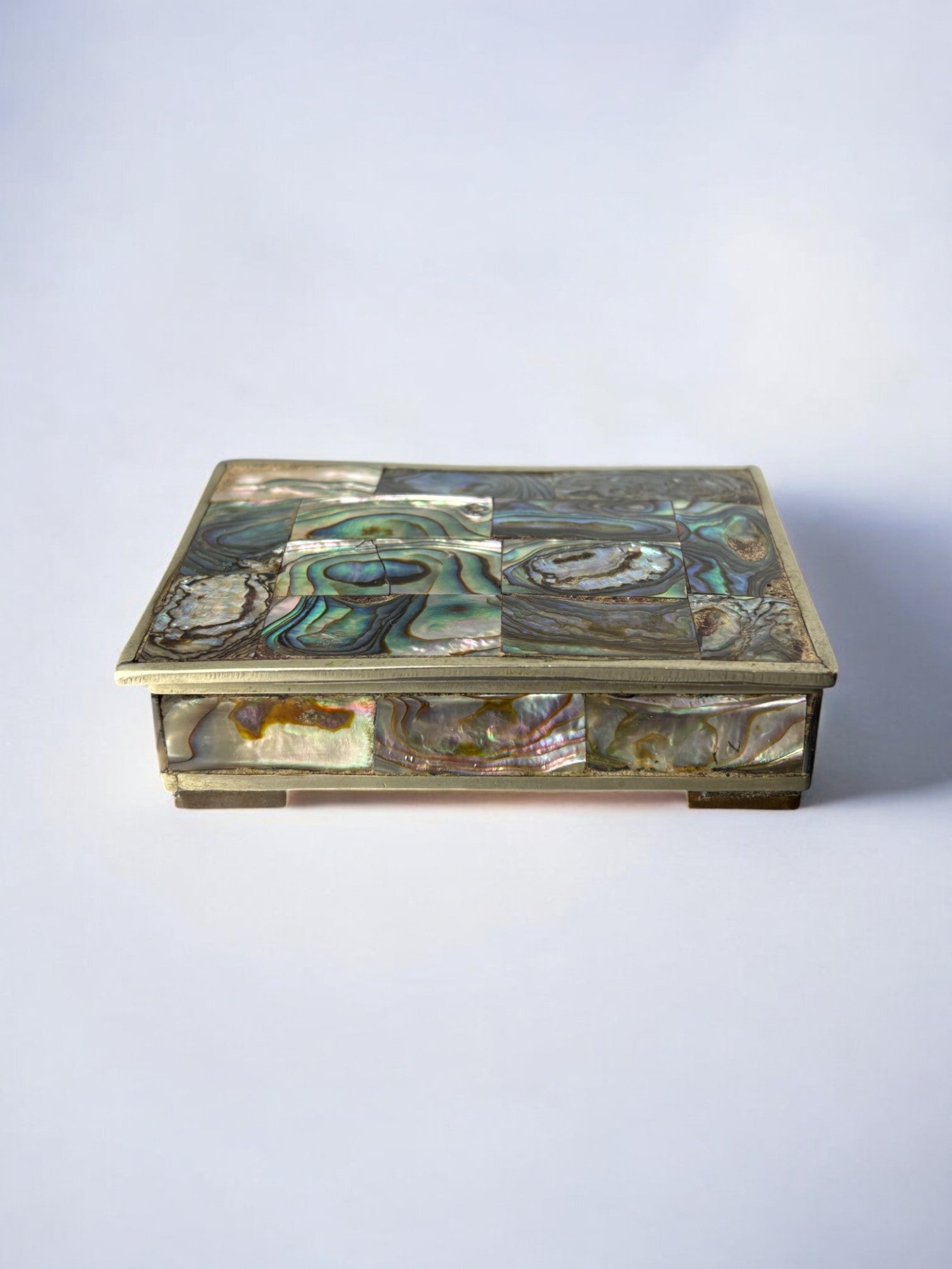 Vintage abalone shell inlay box detail showing iridescent patterns