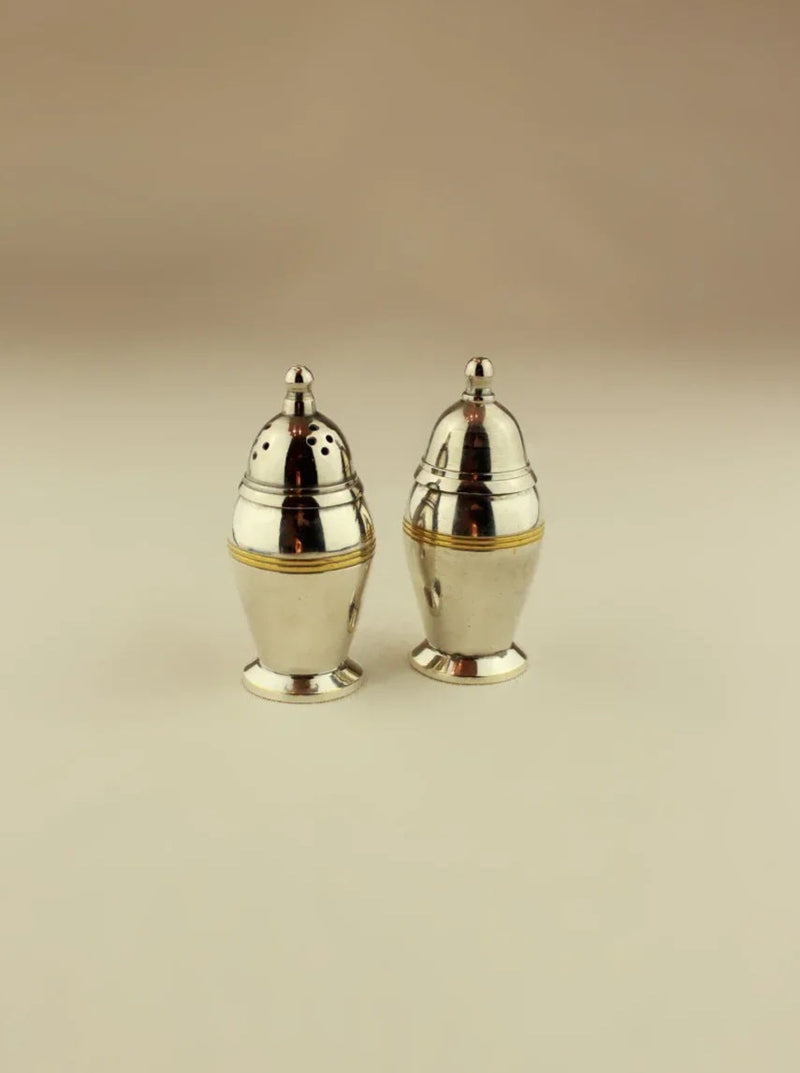 Art Deco Salt and Pepper shakers in silver and black marble, elegant design with geometric patterns, perfect tabletop accessories for stylish dining
