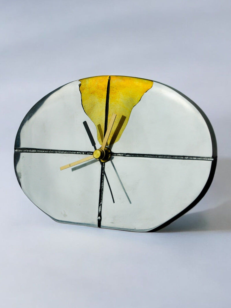 Brutalist clock transparent glass face yellow accent Spain 1980