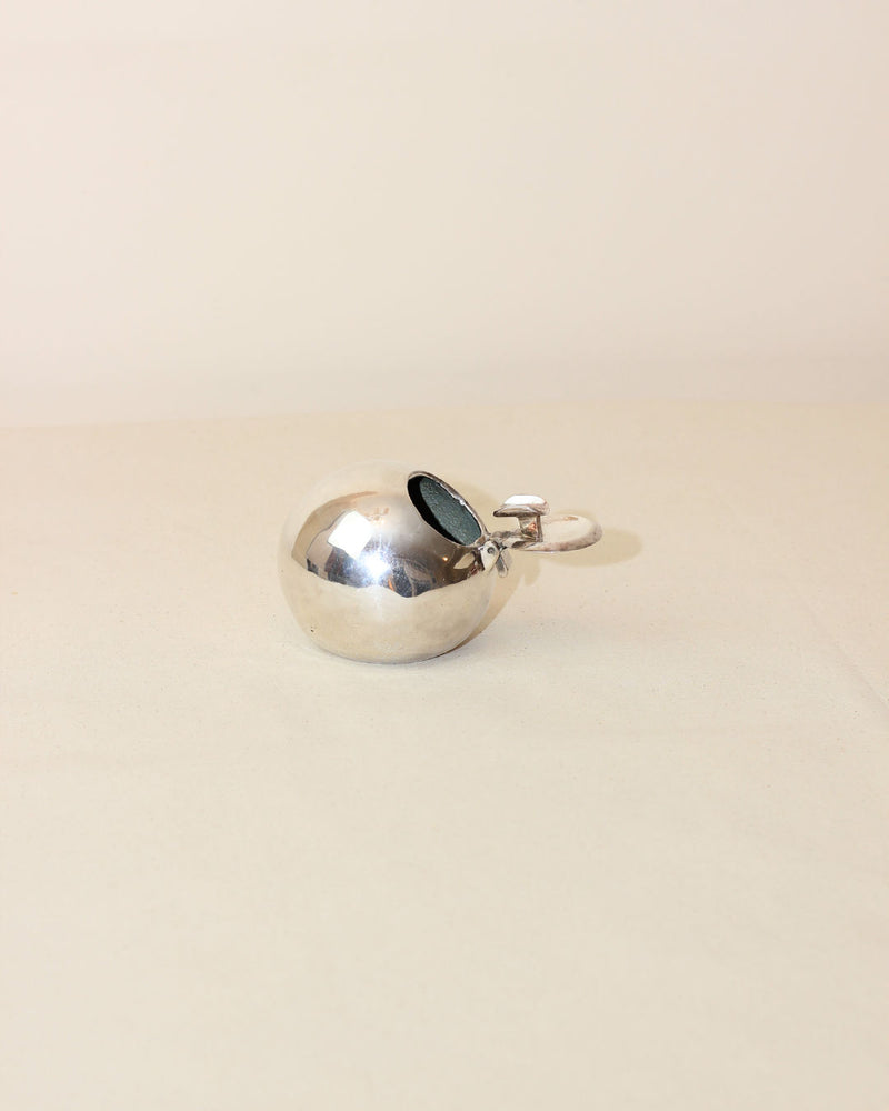 Polished chrome space age ashtray with hinged lid and handle