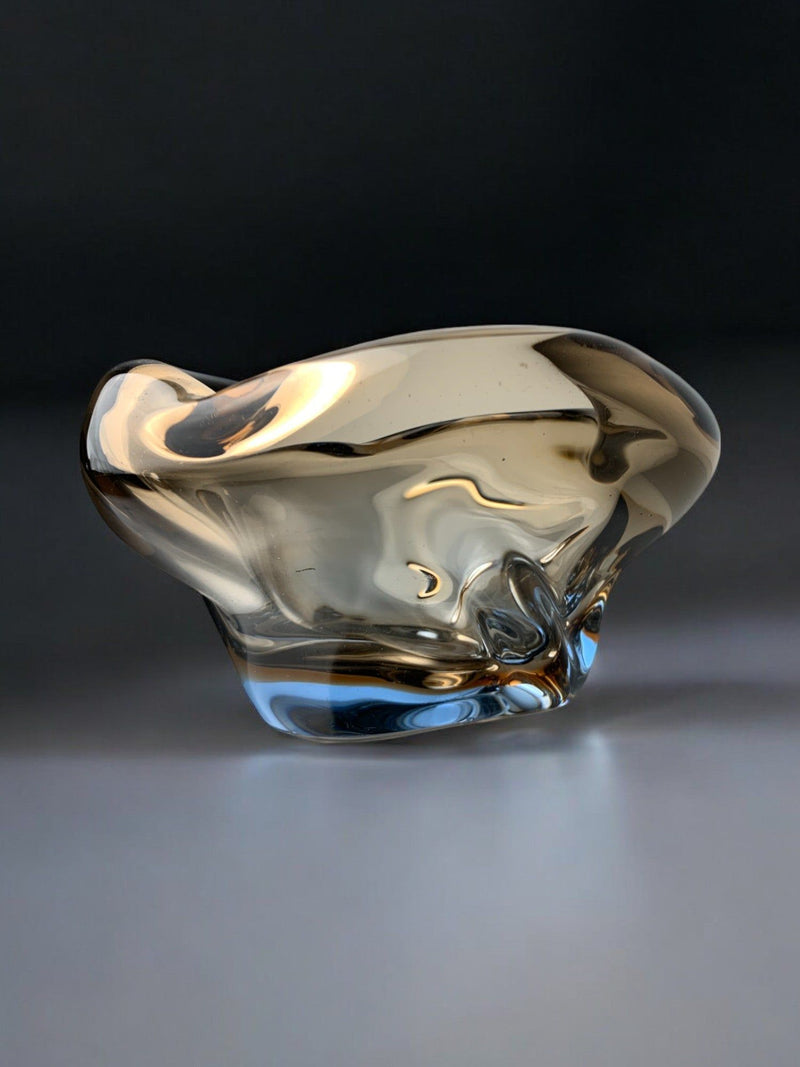 Sommerso amber glass ashtray showing curved sculptural form