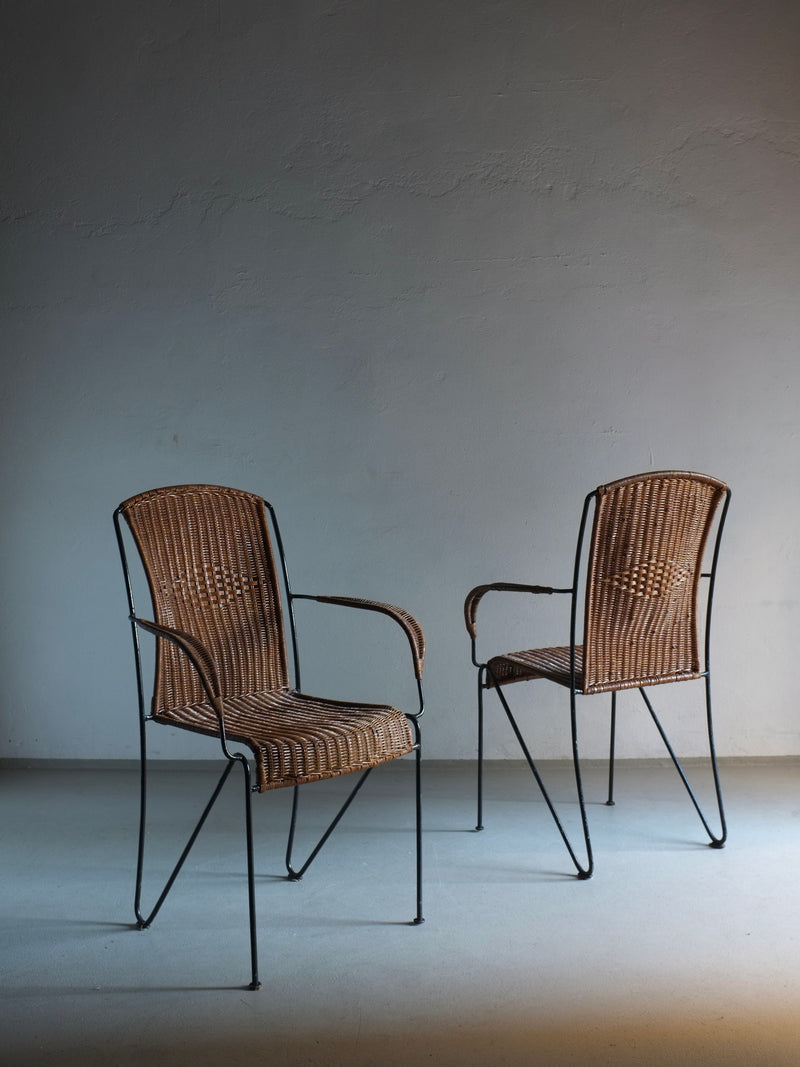 Two vintage wicker iron armchairs with black metal frames, 1960s