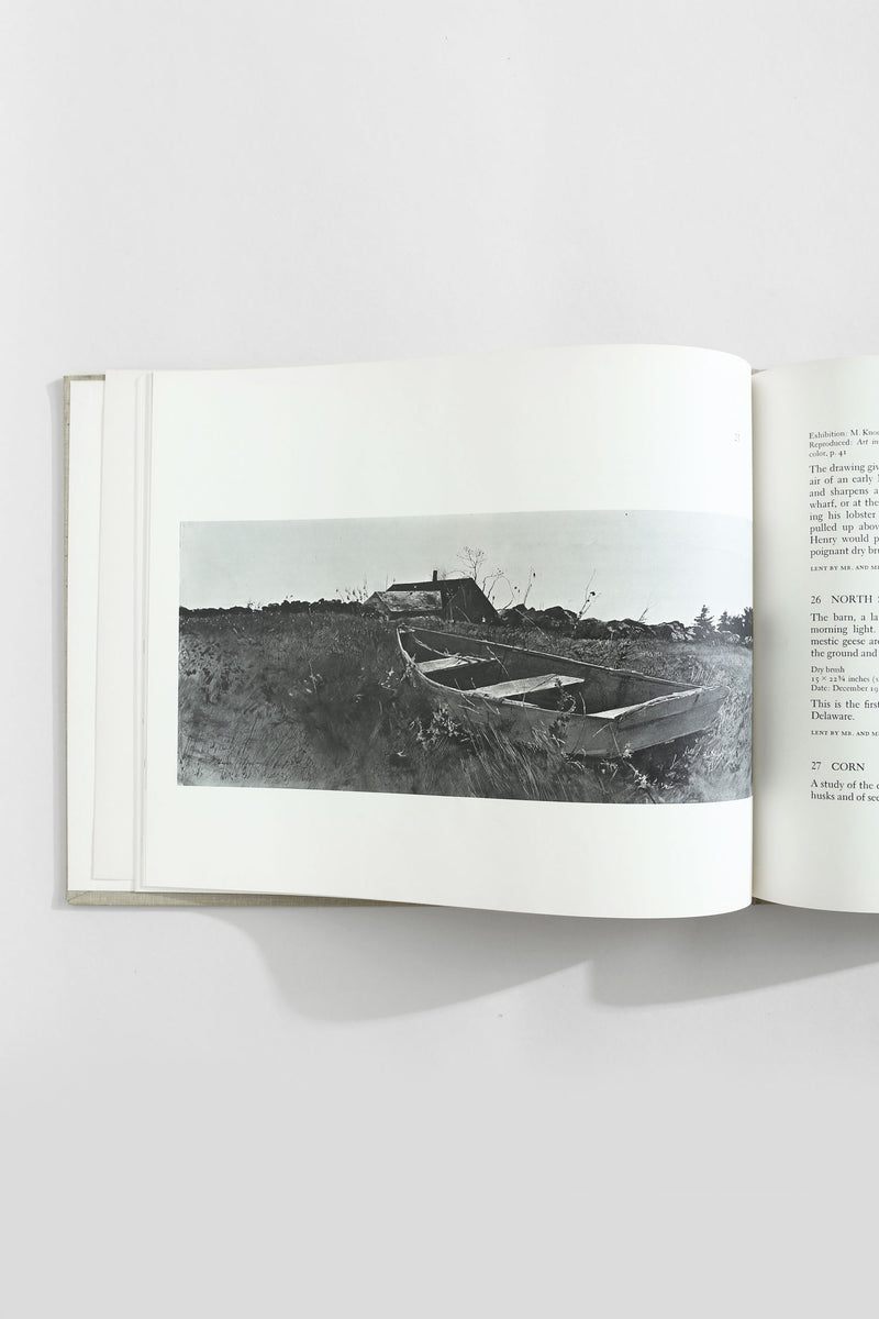 Open Andrew Wyeth art book showing boat illustration page