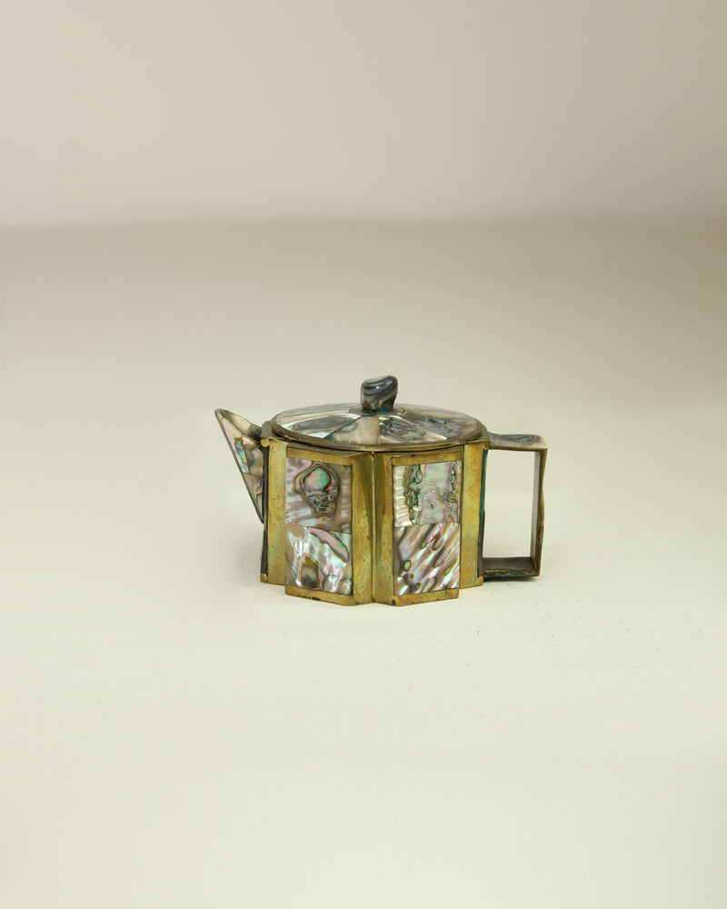 Small octagonal Mexican teapot with abalone shell inlay and brass frame