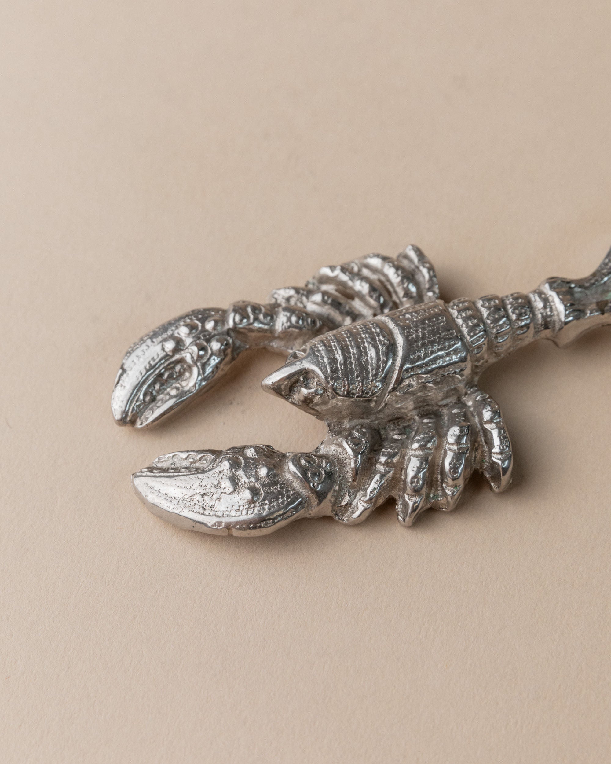Silver plated lobster bottle opener detail view Italy 1960s