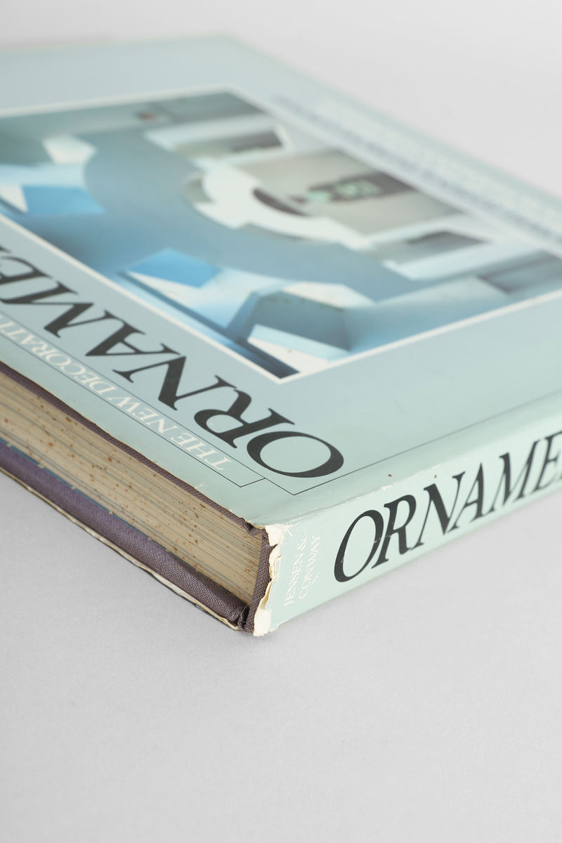Ornamentalism art book spine detail showing mint green cover
