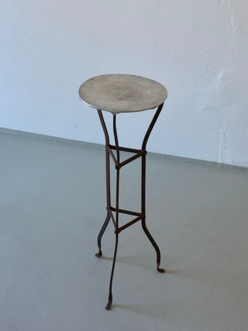 Vintage iron pedestal side table with round weathered top