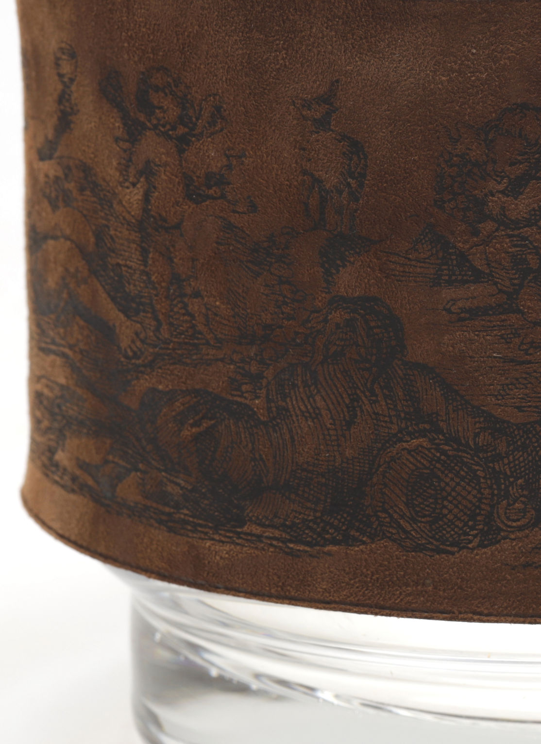 The Ice Bucket and Glasses by Edelglas Wien, from RELIC LONDON circa 1960, feature brown leather with classical etching of cherubs and figures in a pastoral scene wrapped around a glass base, perfect for those who appreciate timeless elegance.