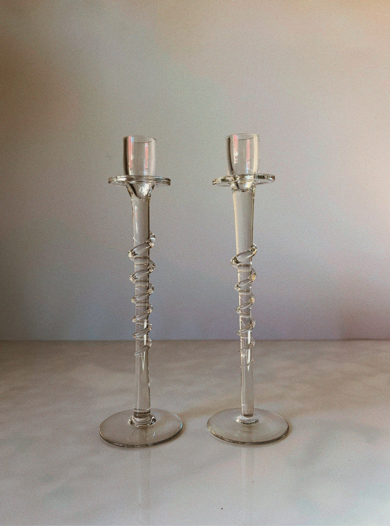 Pair of tall clear glass candlesticks with spiral wire details