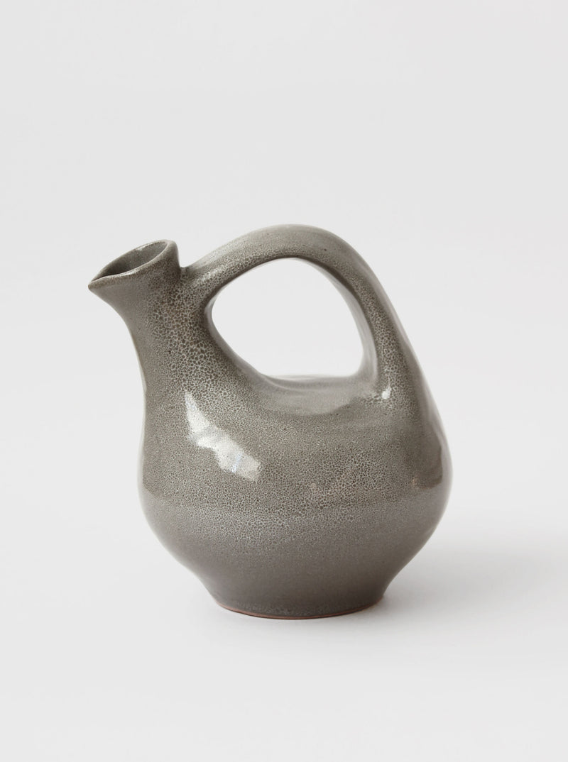 Grey ceramic mid-century jug with curved handle and spout