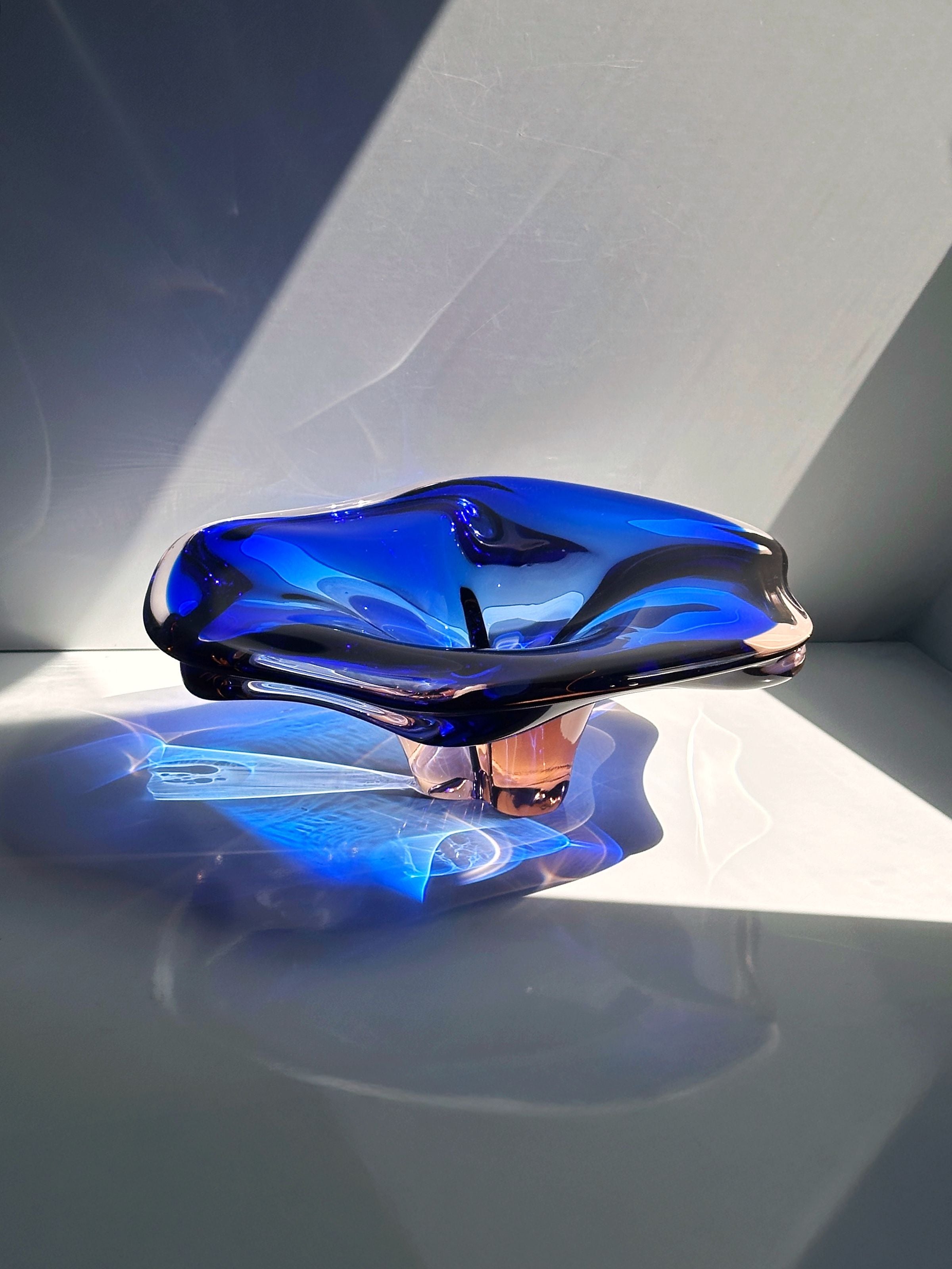 Bohemian glass bowl light refraction detail showing blue tones