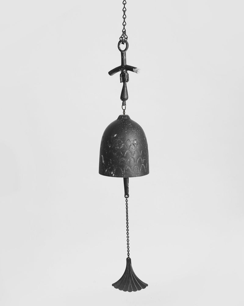 Cast iron windbell with decorative patterns and tassel clapper