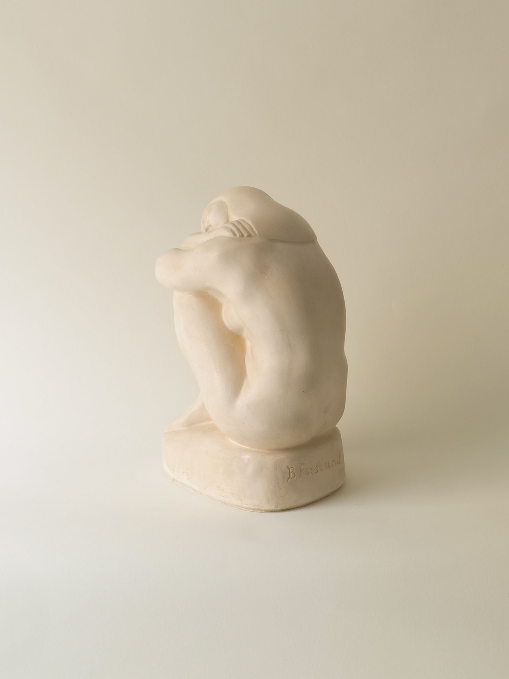 The Resting Sculpture by Collection Apart, named Bror Forslund, is a Swedish marble nude seated with knees to chest and head on arms. Its smooth curves and contemplative pose evoke introspection in the emotive style of figurative art.