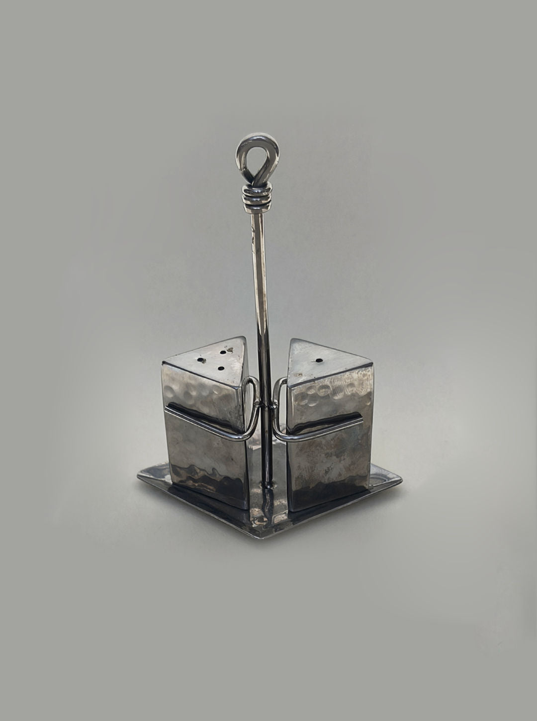 Hammered steel salt and pepper shakers with carrying caddy