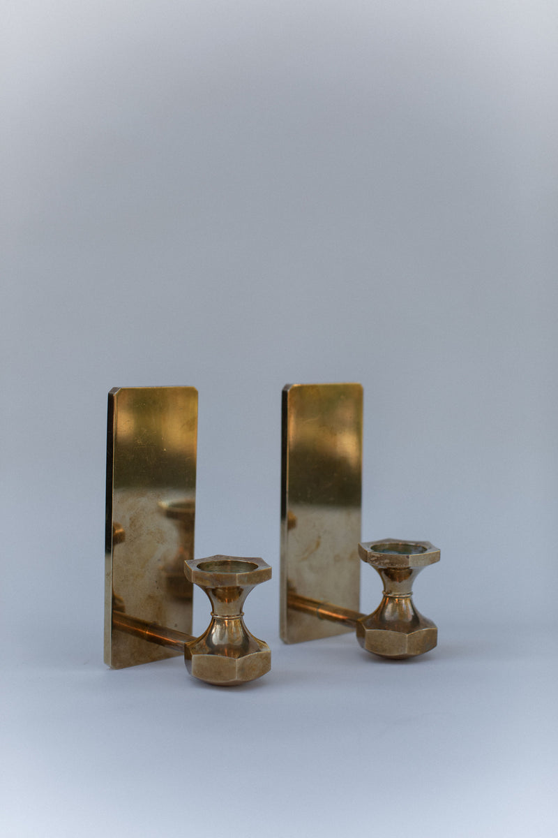 Pair of brutalist brass wall sconces with candle holders