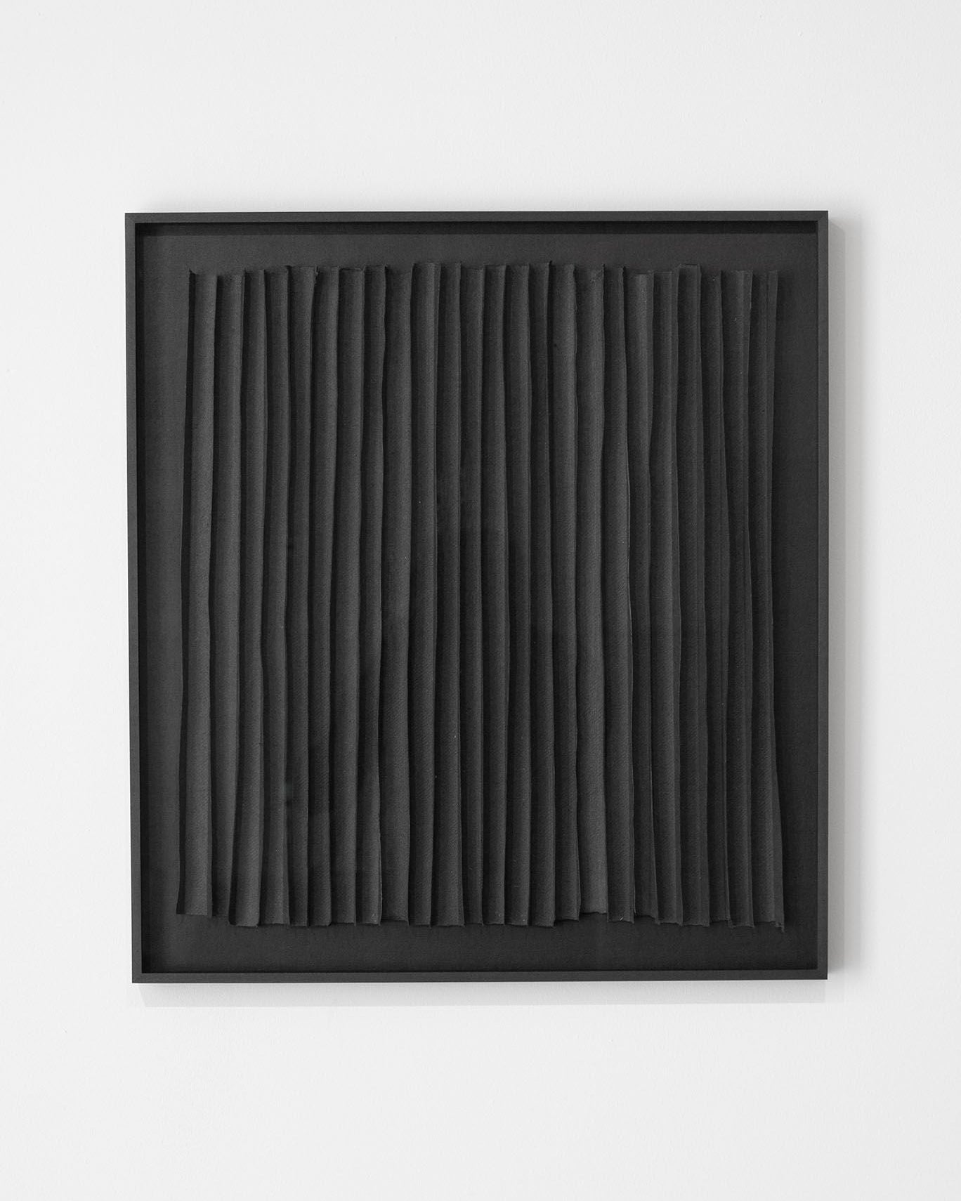 Rhythm Black paper composition with vertical charcoal strips in frame