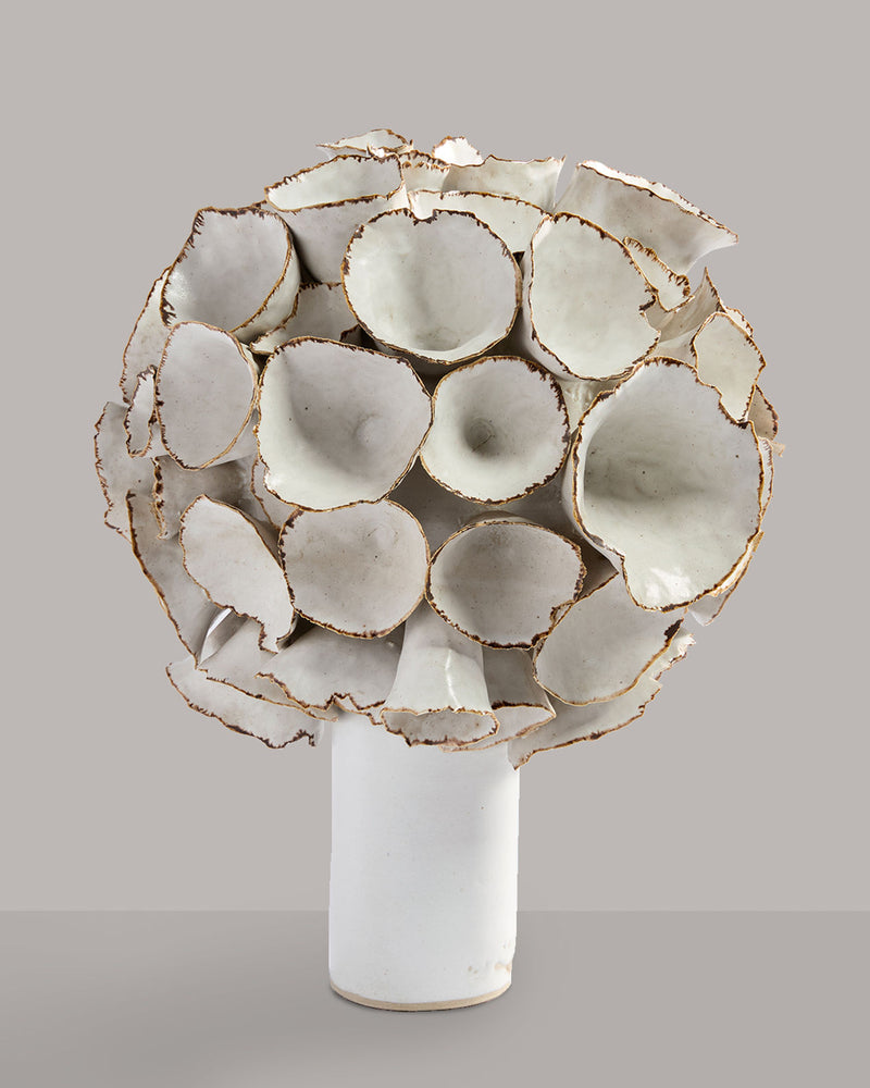 White ceramic sculptural vase with organic tubular forms by Deirdre Burnett