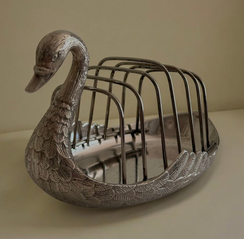 Silver-plated swan toast rack with detailed feather engravings